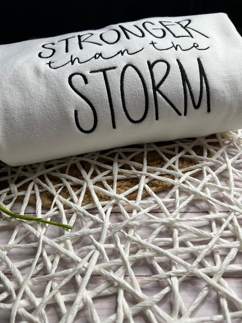 Embroidered "Stronger Than the Storm" Sweatshirt